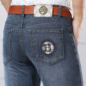 Designer de jeans masculin printemps / été mince denim en denim à la mode masculin slim slim rassin pantalon léger haut de gamme haut de gamme