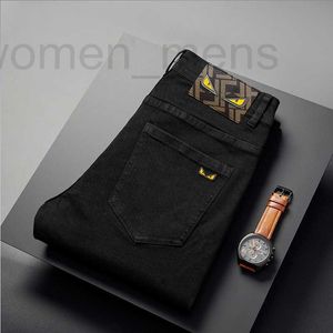 Designer de jeans masculin printemps / été mince extension de mode noir broderie pantalon haut de gamme slim fit pieds za9w