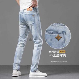Étiquette en acier concepteur de jeans masculin Lumière luxe Qualité de luxe High Grade lavé pour hommes minces jeans slim fit élastique Pantalon de jambe droite polyvalente