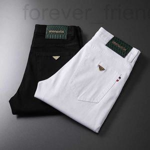 Designer de jeans masculin Summer Silk pur mince noir pour simple et décontracté polyvalent slim slim small pieds pantalon élastique jeune Lam3