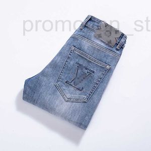 Heren jeans ontwerper zomer nieuw voor high -end merk slanke fit kleine voeten trendy blauwe broek go1x