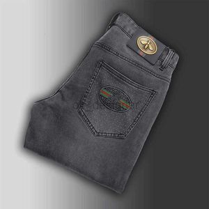 Designer de jeans pour hommes mince luxe noir automne, slim slim fit petit pied pantalon décontracté élastique petit jean à jambe droite élastique