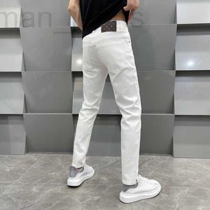Designer de jeans pour hommes Xintang Nouveaux produits européens Printemps et été Pieds minces Pantalons décontractés élastiques Tendance MFUF
