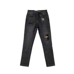 Les jeans masculins ont dessiné le visage souriant Justin Biber Unisexe Broidered Torn Tur avec un patch encre en conserve qualité dre même lavage de panier noir