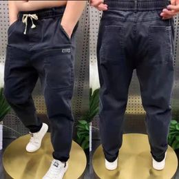 Jeans masculins élastique à cordon de taille élastique pantalon décontracté de haute qualité avec six poches pantalon de vêtements de luxe ample en vrac