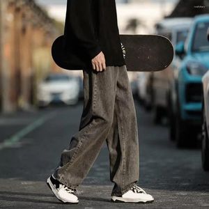 Jeans pour hommes brodés skinny streetwear jambe large avec broderie florale de dessin animé taille élastique profonde pour la mode