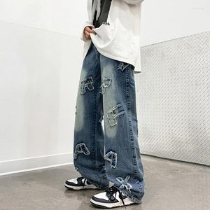 Jeans da uomo Europeo Americano Personalità della moda Lettera Stick Panno Strada Pantaloni larghi gamba dritta Pantaloni larghi in cotone Abbigliamento Hip Hop