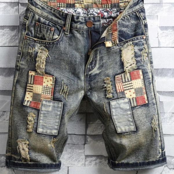 Pantalones vaqueros para hombre Pantalones cortos de mezclilla de moda Pantalones de agujeros rectos sueltos de verano para hombre Patrón de mendigo Parche arruinado Pantalones de hip hop Adolescente