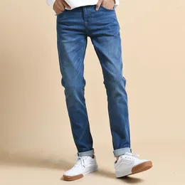 Jeans masculin mode mince petits pieds pantalons élastiques mid-jumelés en trois dimensions coupées zipper business masculin denim