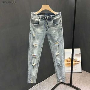 Jeans masculins à la mode des vêtements de rue coréens jeans classiques avec trous d'été trous en détresse trous élastiques leggingsl2403
