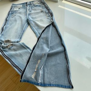 Jeans pour hommes et femmes Bleu Designer Version France Paris Zipper Haute Qualité Lâche Pantalon Hip-Hop Coton Lettre Motif