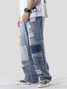 Jeans para hombre Four Seasons Jeans para hombre Streetwear Patchwork Bordado Fringe Hip Hop Pantalones de mezclilla sueltos Bloque de color de gran tamaño Patchwork Z0225