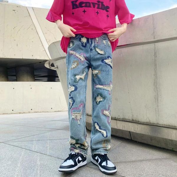 Jeans pour hommes Graffiti Hommes Streetwear Mode américaine Y2K Pantalon masculin Élastique Ins Trou coloré Dessin Denim Pantalon Baggy