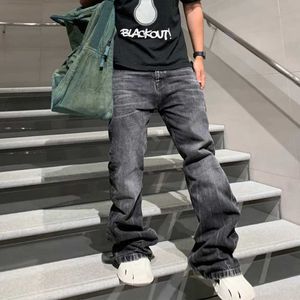 Jeans masculin Harajuku lavé les pantalons de denim rétro à la jambe large masculine et les poches de rue des femmes.