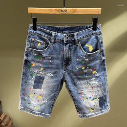 Jeans pour hommes de haute qualité marque de graffitis graffitis cassé stretch slim broderies patchs spray peinture en jean short