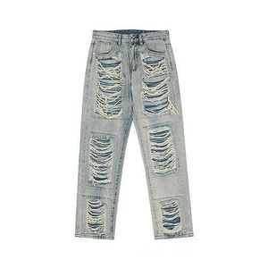 Heren jeans High Street, grote gaten, bebaarde jeans, geplakte rechte broek