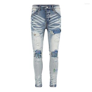 Jeans pour hommes High Street Fashion peinture à l'huile bleu plissé Patch déchiré pantalon Design Slim petits pieds Patchwork Denim pantalon
