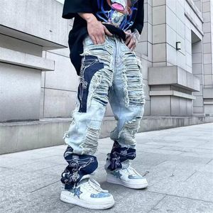 Jeans para hombres High Street Hole Fringe Bordado Pantalones para hombre Bloque de color Borla Ripped Retri Denim Pantalones Oversize Baggy Jean235H