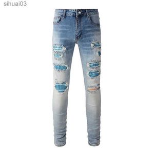 Jeans masculin High Street Perforated Bleu Crystal Patch High Elastic Ultra Min Patch Patch en détresse Jeansl2403