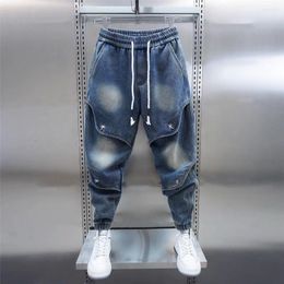 Jeans pour hommes Hip Hop Pantalons de rue plissés Embellissement croisé Harajuku Pantalons pour hommes bleus