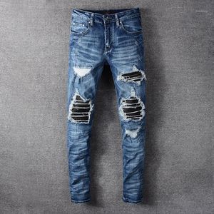 Jeans pour hommes Hip Hop trous froissés bleu hommes à la mode en cuir Patchwork Slim Fit pantalon Stretch grande taille quatre saisons Denim pantalon