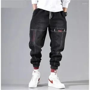 Jeans masculin coréenne de mode coréenne en denim bandes pantalon de cargaison gris noir pour streetwear harem en baggy élastique hip hop