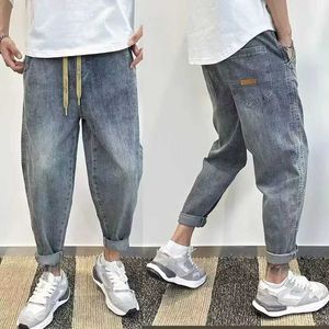 Jeans masculin coréen vêtements de luxe lâche pantalon harem brossé masculin et jean élastique lavé rétro