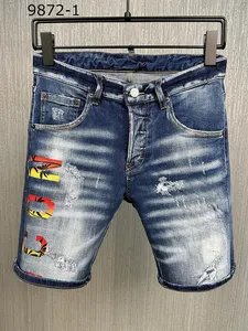 Jeans pour hommes shorts manqués courts denim pour l'homme bleu semi-pantalon pour hommes culotte trouble bouton métal