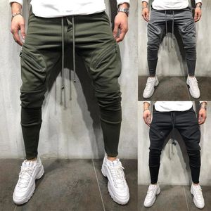 Jeans pour hommes Pantalons décontractés pour hommes Mode Sports Poche zippée Pantalon de jogging Pieds européens et américains