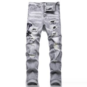 Jeans pour hommes concepteurs hommes broderie de streetwear de jean gris trous de street