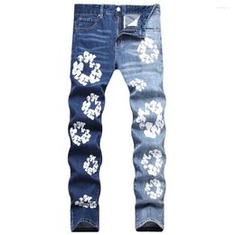 Jeans pour hommes hommes fleuris imprimables de mode Couleur de contraste épissé pantalon denim extensible peint pantalon raide mince bleu blanc noir