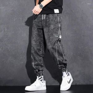 Jeans pour hommes hommes lâches liées à la mode coréenne Harlan streetwear cordon de crampon harajuku pantalon de fret de jean baggy