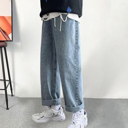 Jeans para hombres Hombres sueltos Ajuste recto Pierna ancha Botón de talle medio Bolsillos con cremallera Pantalones de mezclilla casual Streetwear