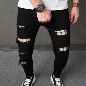 Jeans masculin masculin nouveau strtwear ripped patch slim jeans pantalon élégant trous mâles pantalon denim au crayon décontracté y240507