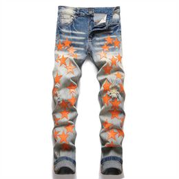 Jeans pour hommes Hommes Orange Patchs en cuir Stretch Denim Jeans Streetwear Trous Ripped Pantalon effilé Vintage Pantalon bleu en détresse T221102