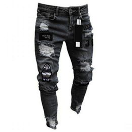 Heren jeans mannen rekbare gescheurde mager fietser borduurwerk cartoon print jeans vernietigd gat slank fit denim hoge kwaliteit hiphop zwarte jeans 220827