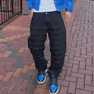 Jeans masculin Strt hiphop élégant patch déchiré épissé un pantalon de jean de bonne qualité.