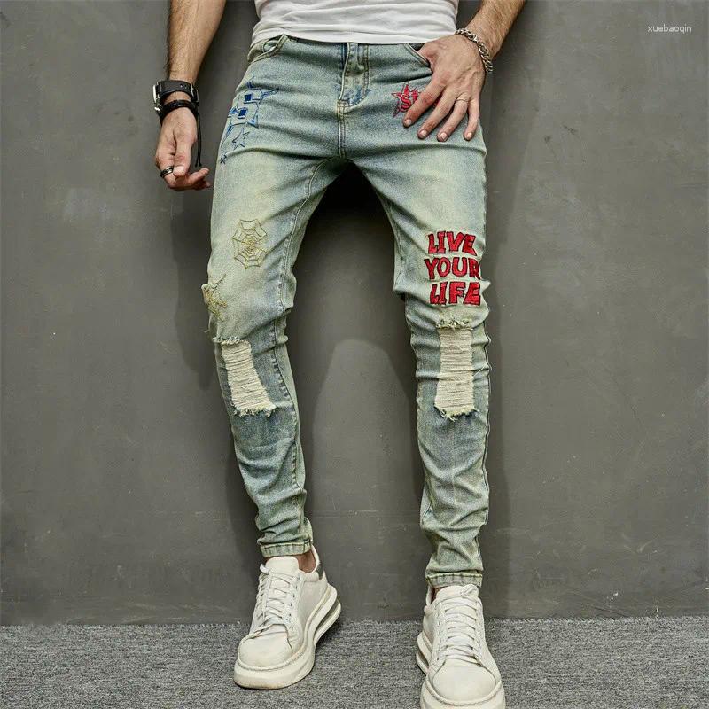 Mäns jeans män vintage snygga broderier rippade hiphop slim blyerts manliga stretchhål avslappnade denimbyxor