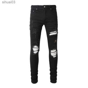 Heren jeans heren gekraakt zilveren lederen patch fiets jeans straatkleding strakke band elastische denim broek gat gebarsten patch zwarte broeksl2403