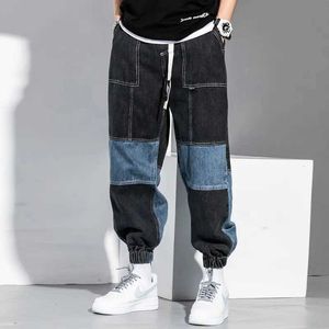 Jeans masculin pour hommes Hip-hop Couleur assortie pantalon lâche et léger Harem Autumn Mens Patch Work Black Jeans surdimensionné denim Q240427