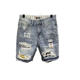 Jeans pour hommes pour hommes en vente en gros 2021 coréen hommes hommes décontractés troubar trou de jean shorts marques imprimées pantalons courts déchirés