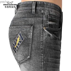 Jeans masculin jeans masculine hiver épais coton bruce shark mode décontracté jambe droite élastique douce lâche classique italien grand masque pantl2404