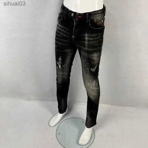 Jeans pour hommes Pantalons pour hommes nouveaux jeans luxueux et à la mode avec des jambes fuselées de haute qualité décontracté Harajuku ultra-mince rayé pantalonL2403