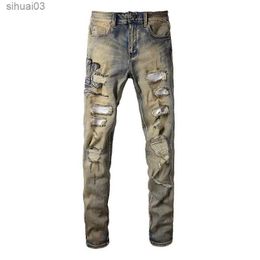 Heren jeans heren slang geborduurde denimjeans met retro blauwe slanghuid lederen patch elastische broekbroek2403
