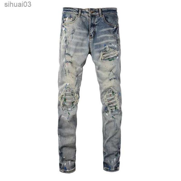 Jeans pour hommes pour hommes peintes peintes élastiques denim jeans jeans vêtements de rue Crack Patches de travail trous des larmes