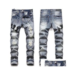 Jeans masculin étoile étoile brodée pantalon de trou déchiré de moto graphique slip street hop streetwear punk denim vêtements 230606 drop de dhubw