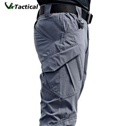 Jeans pour hommes Pantalon tactique pour hommes Pantalon tactique à poches multiples Élasticité militaire Pantalon tactique urbain Hommes Slim Fat Cargo Pant 5XL 230817