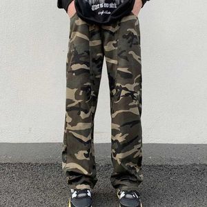 Jeans masculins New American Fashion Brand Camouflage Camouflage Denim Jeans For Mens Designer Patchwork Straight Loose Pantal