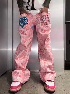 Jeans masculin nouveau Design semble de l'artisanat lourd Camouflage rose Jeans brodés Broidé