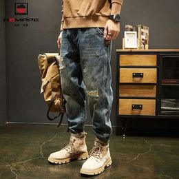 Jeans masculin nouveau designer streetwear denim pour hommes ripped trous patch mens vêtements mode adolescent solide pantalon baggy harem coréen Q240427